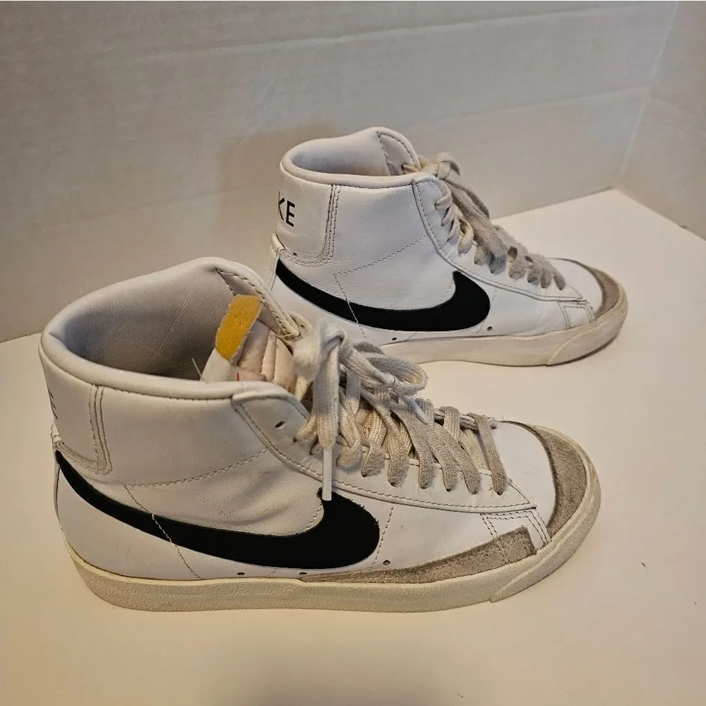 Nike leather hi top sneakers size 6. White with black swish